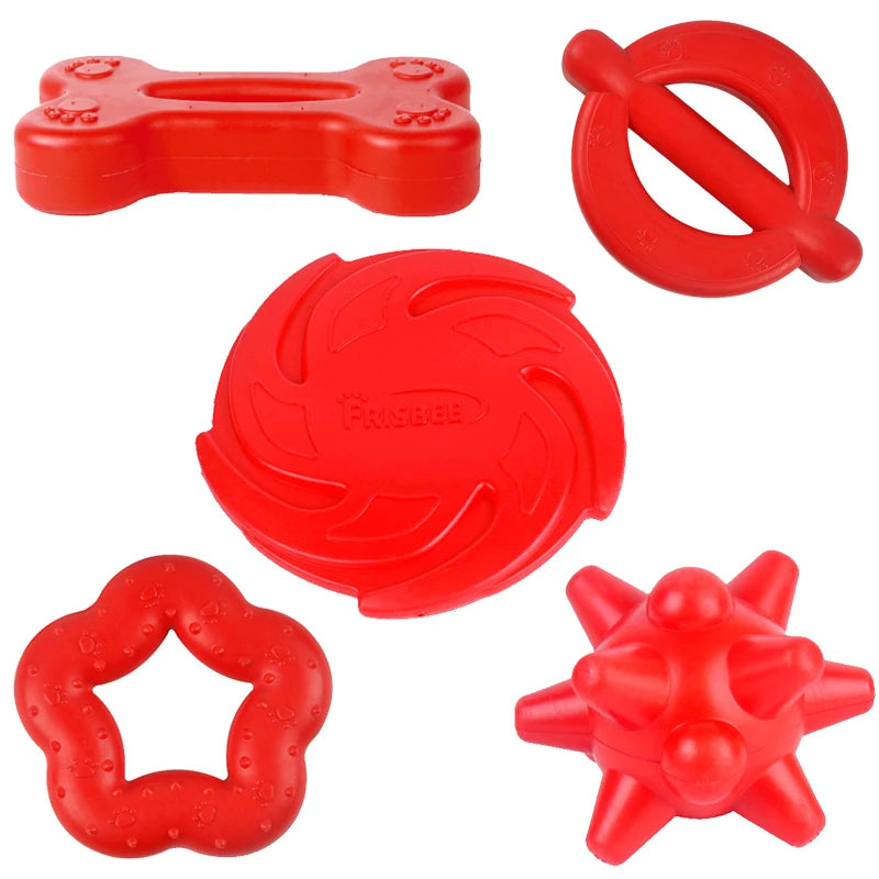 A collection of red, durable bite-resistant dog chew toys and dental products.