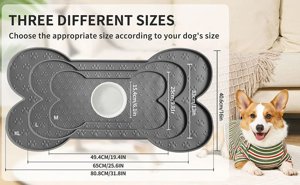 Gray silicone pet feeding mat in three sizes for dogs with raised edges shown next to a dog