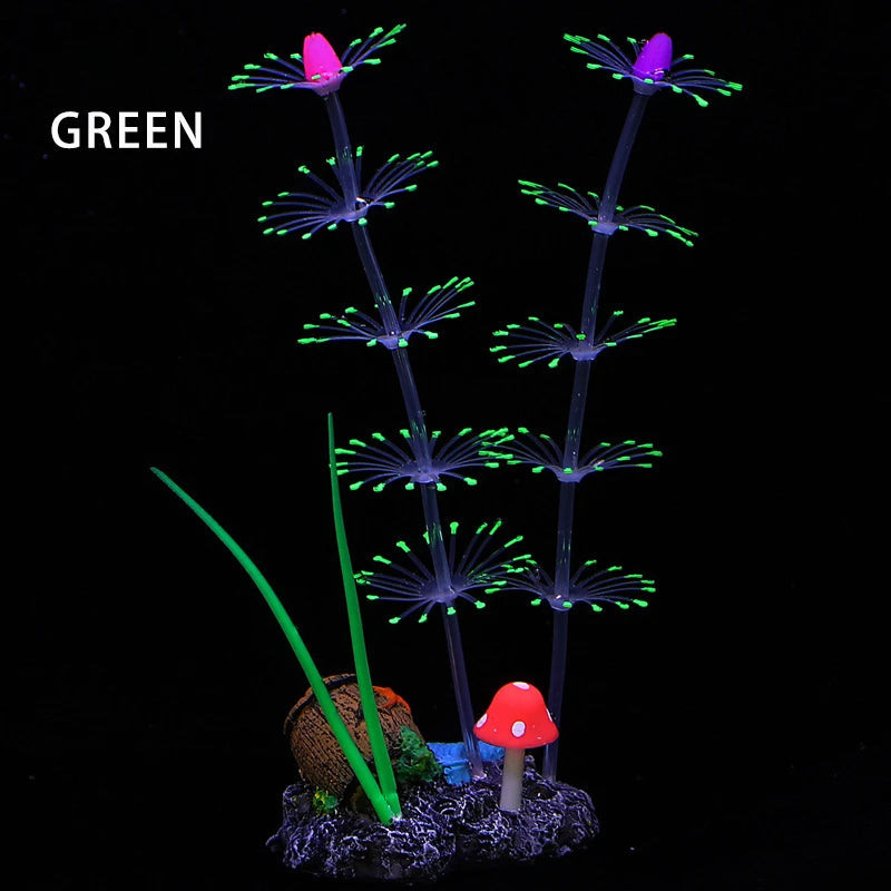 Brotes de pasto de agua de acuario de silicona fluorescente verde con puntas moradas y un hongo rojo.