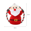 A plush toy of Santa Claus with a white beard and red suit, designed as a squeak toy for dogs.