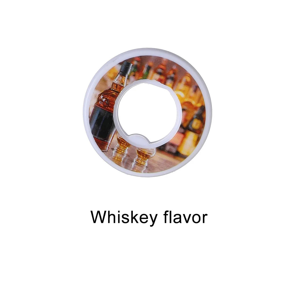 A round flavor pod for water bottles with an image of whiskey.