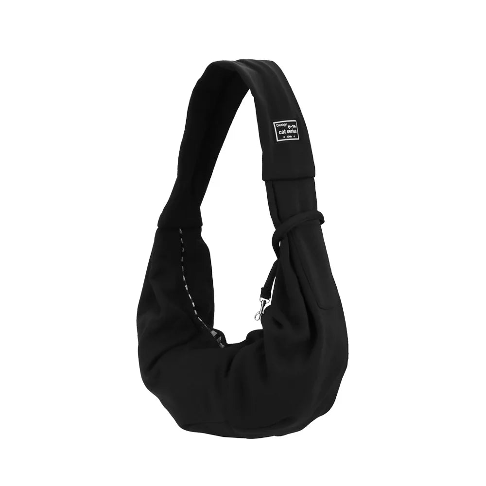 Schwarze tragbare Hundetasche mit gepolstertem Design.
