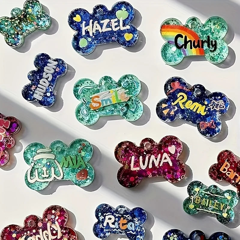 A collection of colorful silicone dog bone molds used for resin casting, featuring various glitter and colored designs.