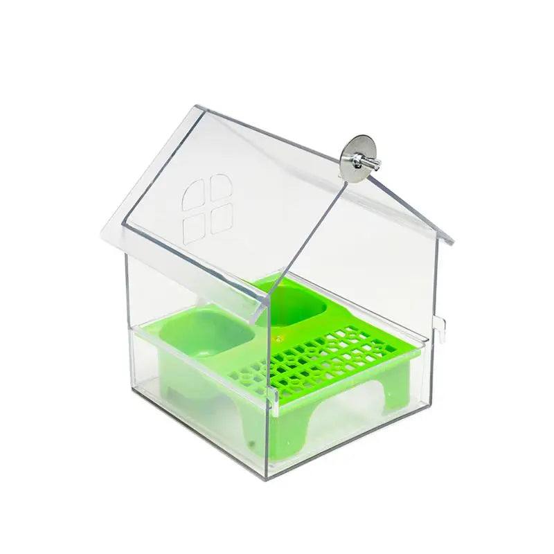 Clear plastic bird feeder with a green tray and a hinged lid.
