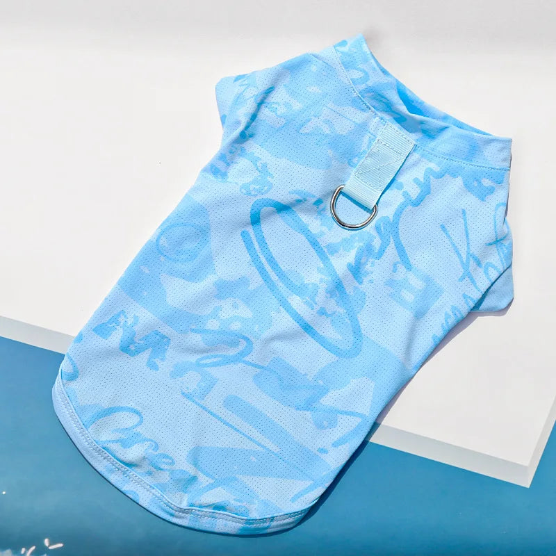 Light blue ice silk cooling vest for dogs and cats shown flat on a white surface.