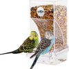 A clear anti-spill automatic bird feeder with a perch containing bird seed, featuring a blue and green parrot.