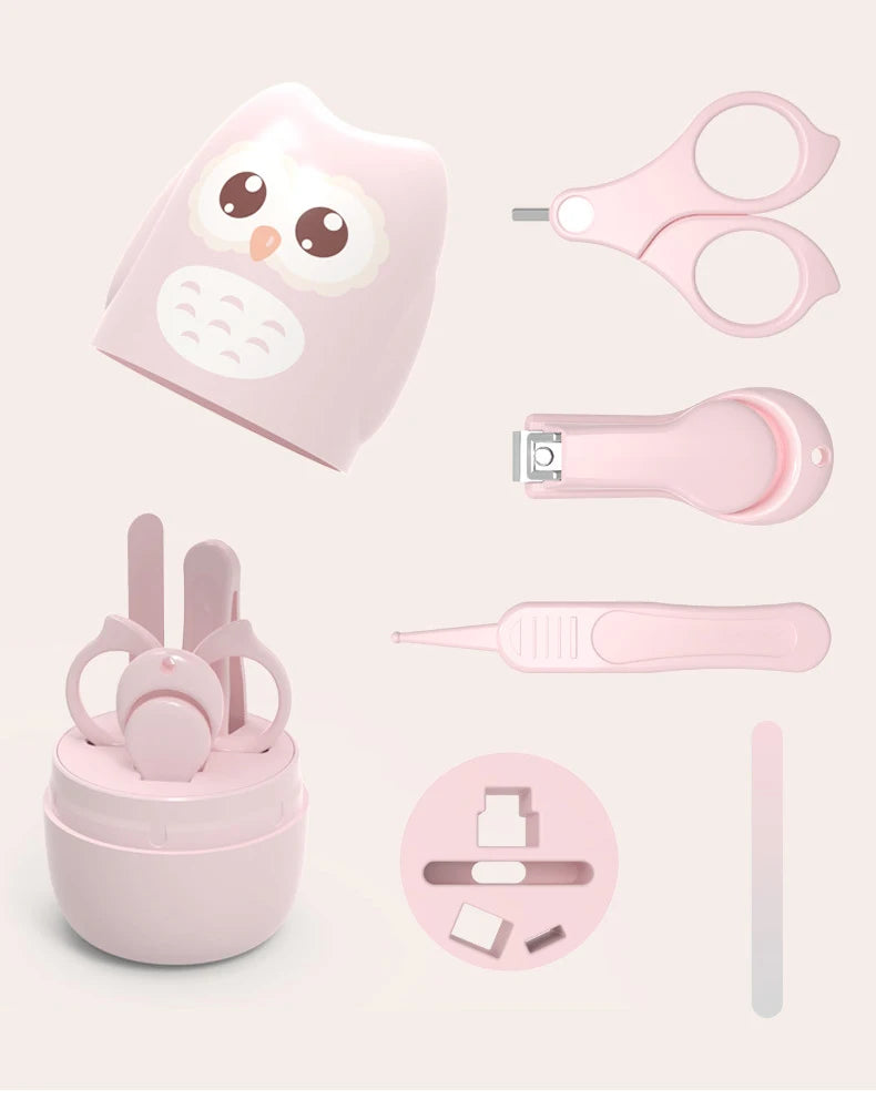 A pink portable nail care set featuring a pair of small scissors, a cuticle pusher, and a nail file.