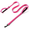 A pink heavy duty reflective dog leash with dual handles shown against a white background.