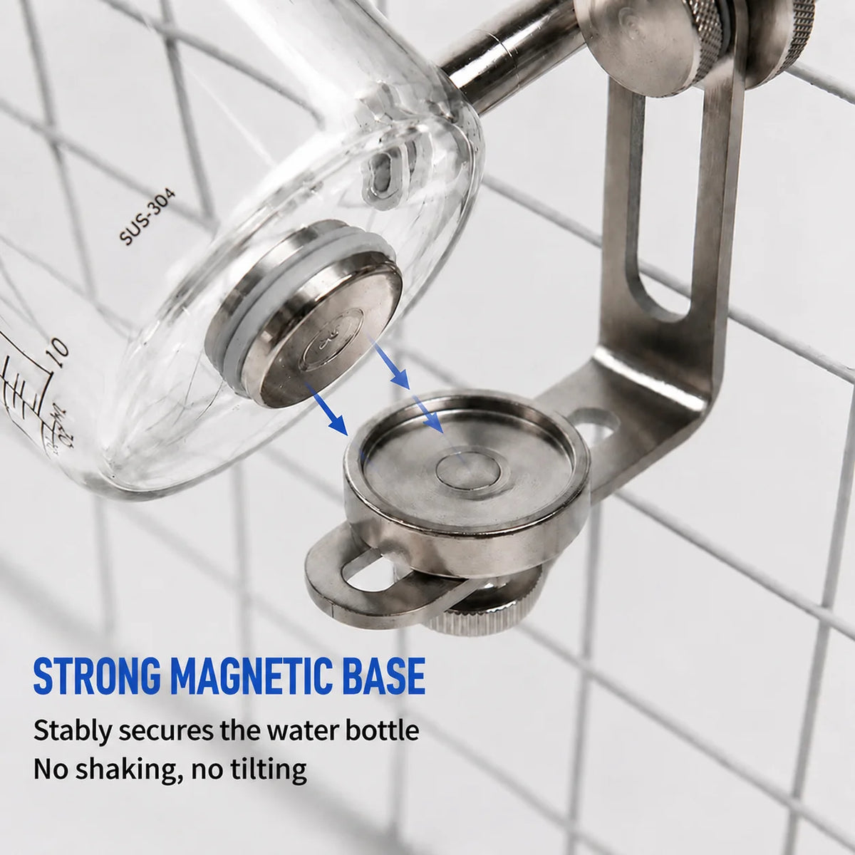 A clear glass water bottle is securely held by a stainless steel magnetic base on a wire grid.
