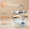 A stainless steel automatic cat water fountain with a spout and a clear reservoir for fresh water.
