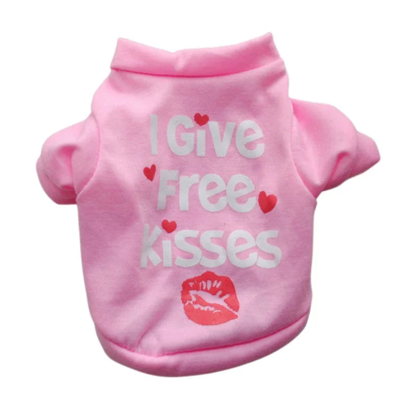 Pink cotton dog vest with text that reads I Give Free Kisses