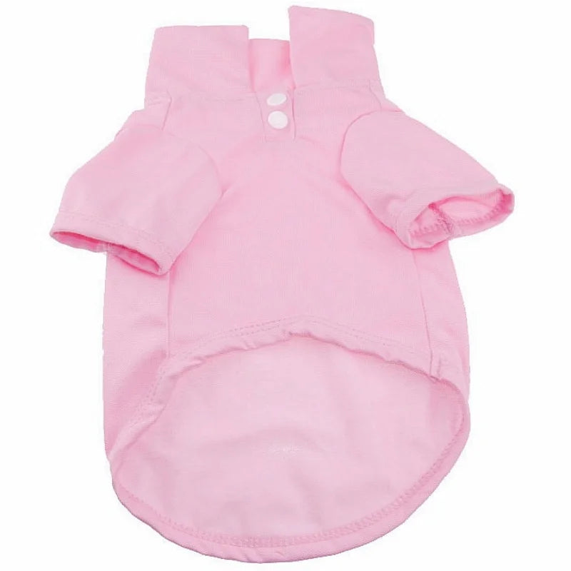 A pink classic polo shirt for a small dog, featuring a collar and buttons.
