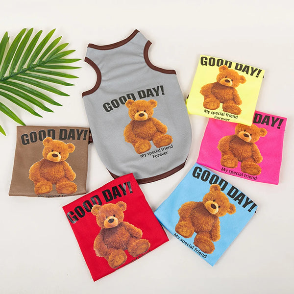 A collection of five pink, yellow, and gray sleeveless pet vests featuring cute bear prints for dogs and cats.
