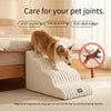 A beige pet safety ladder with multiple steps is shown next to a bed, designed to help small or elderly dogs get on and off t