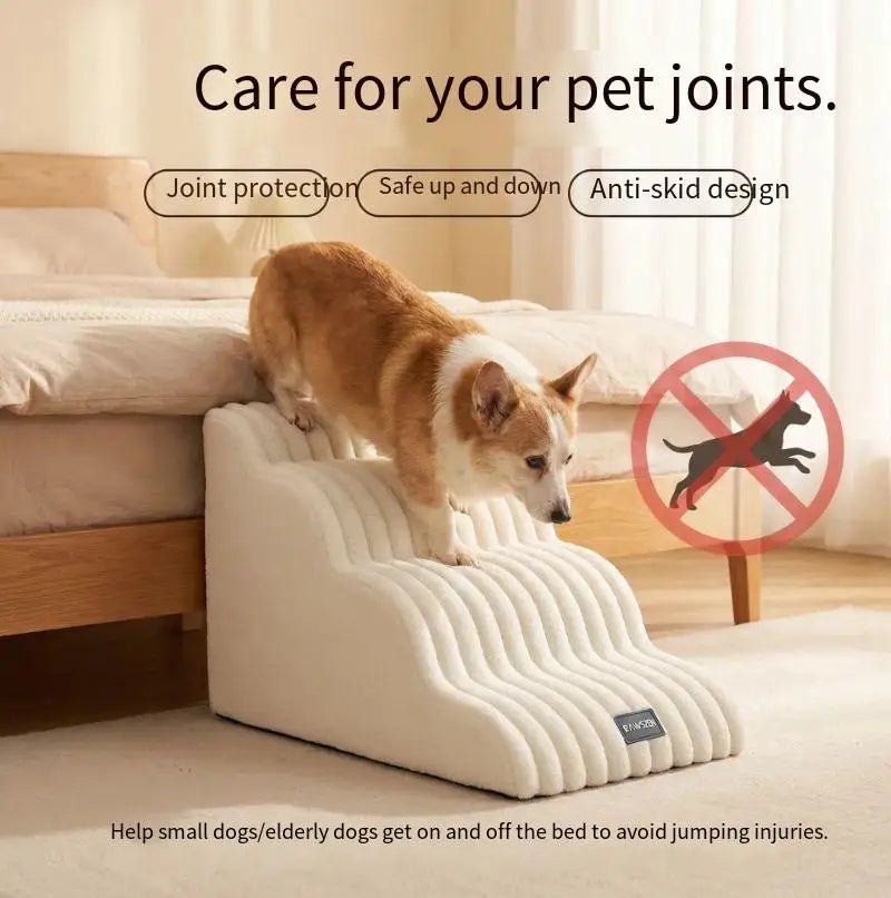 A beige pet safety ladder with multiple steps is shown next to a bed, designed to help small or elderly dogs get on and off t