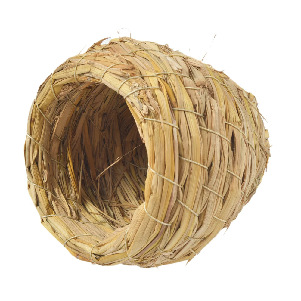 Handmade natural straw bird nest woven from dried plant material.