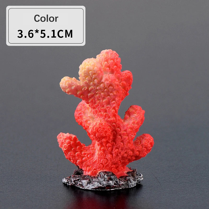 Bright red and orange resin coral decoration with a textured surface mounted on a dark base