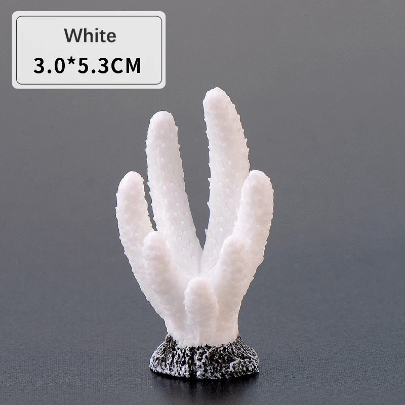 White resin coral decoration shaped like a hand, mounted on a dark base.