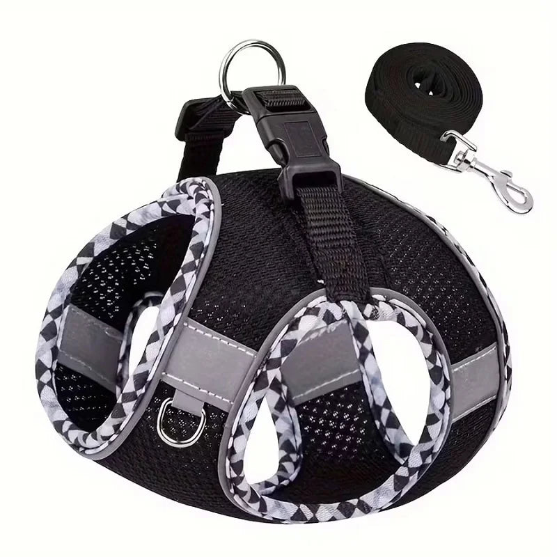 Black reflective dog and cat harness with attached leash and strap