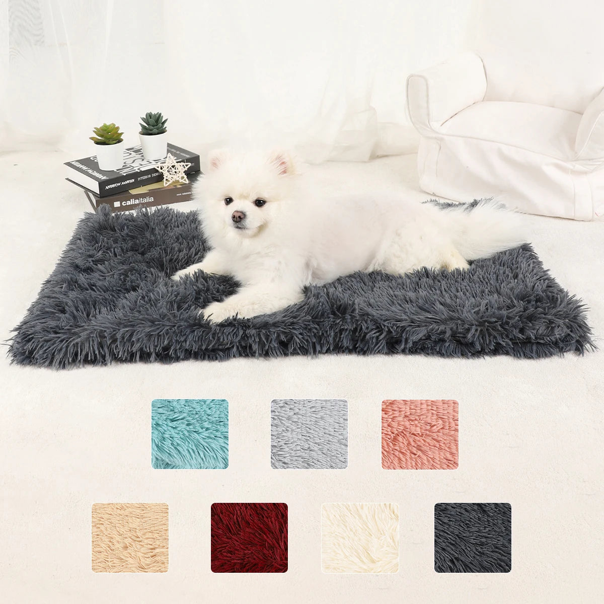 A collection of square plush pet blankets in various colors including teal, gray, pink, and black.