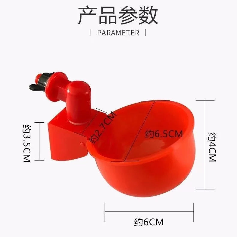 An orange automatic poultry drinking cup with a red nozzle and mounting bracket.