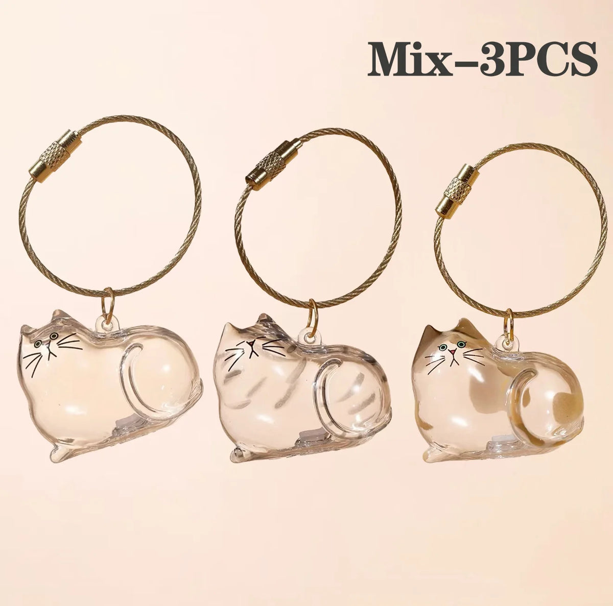 Three glass cat figurines with gold-colored loops and jump rings for pet hair keepsakes