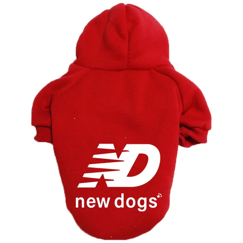 A bright red cozy fleece hoodie with a white New Dogs logo on the chest.