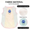 A white and pink fabric dog vest with a blue D-ring for attaching a leash, highlighting soft, breathable, and elastic materia