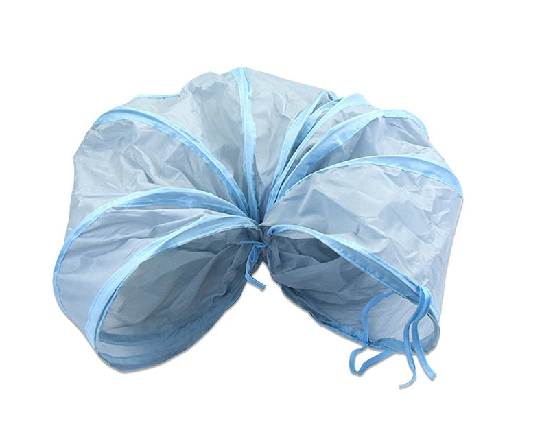 A light blue foldable cat tunnel with a peep hole, shown folded and partially opened.