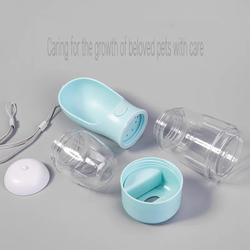 A light blue portable pet water bottle with a leak-proof travel dispenser and related accessories.
