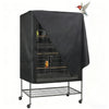A black Oxford cloth bird cage cover is shown over a wire cage resting on a metal stand.