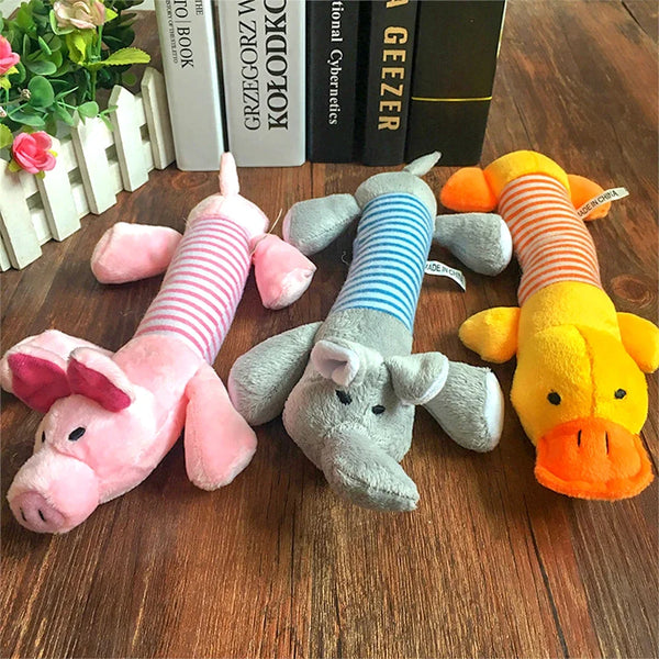 Three fleece squeaky pet toys shaped like an elephant, duck, and pig for dogs and cats