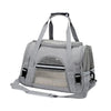 A gray foldable pet travel carrier bag with a breathable mesh window and carrying straps.