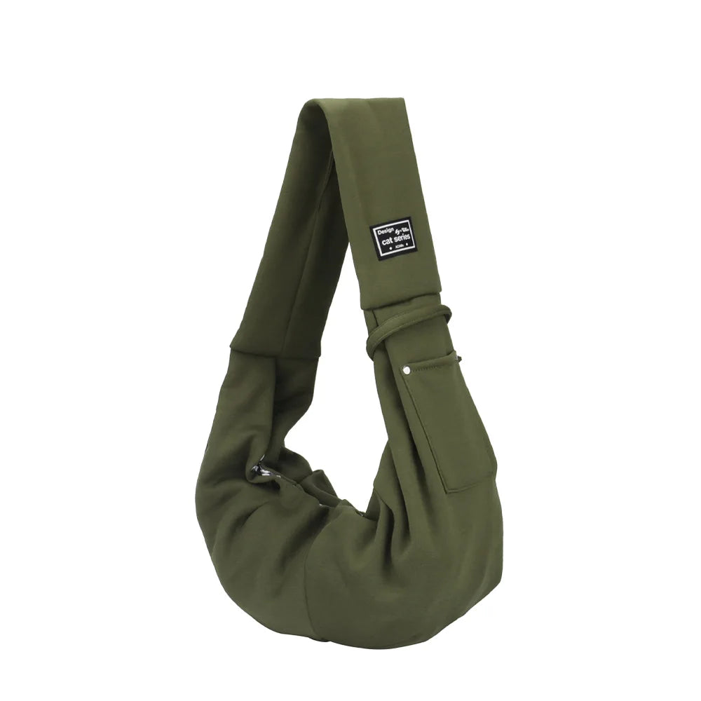 Grüne tragbare Hundetasche in Form einer Schultertasche, vertikal dargestellt.