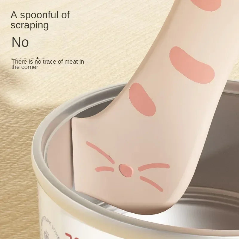 A pink silicone spoon is shown inside a can, with text indicating no trace of meat in the corner.