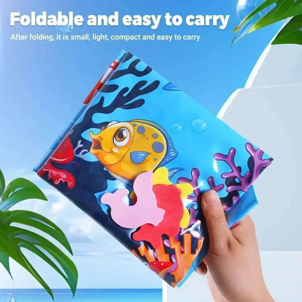 A bright blue foldable sensory water play mat for pets is being held by a hand.