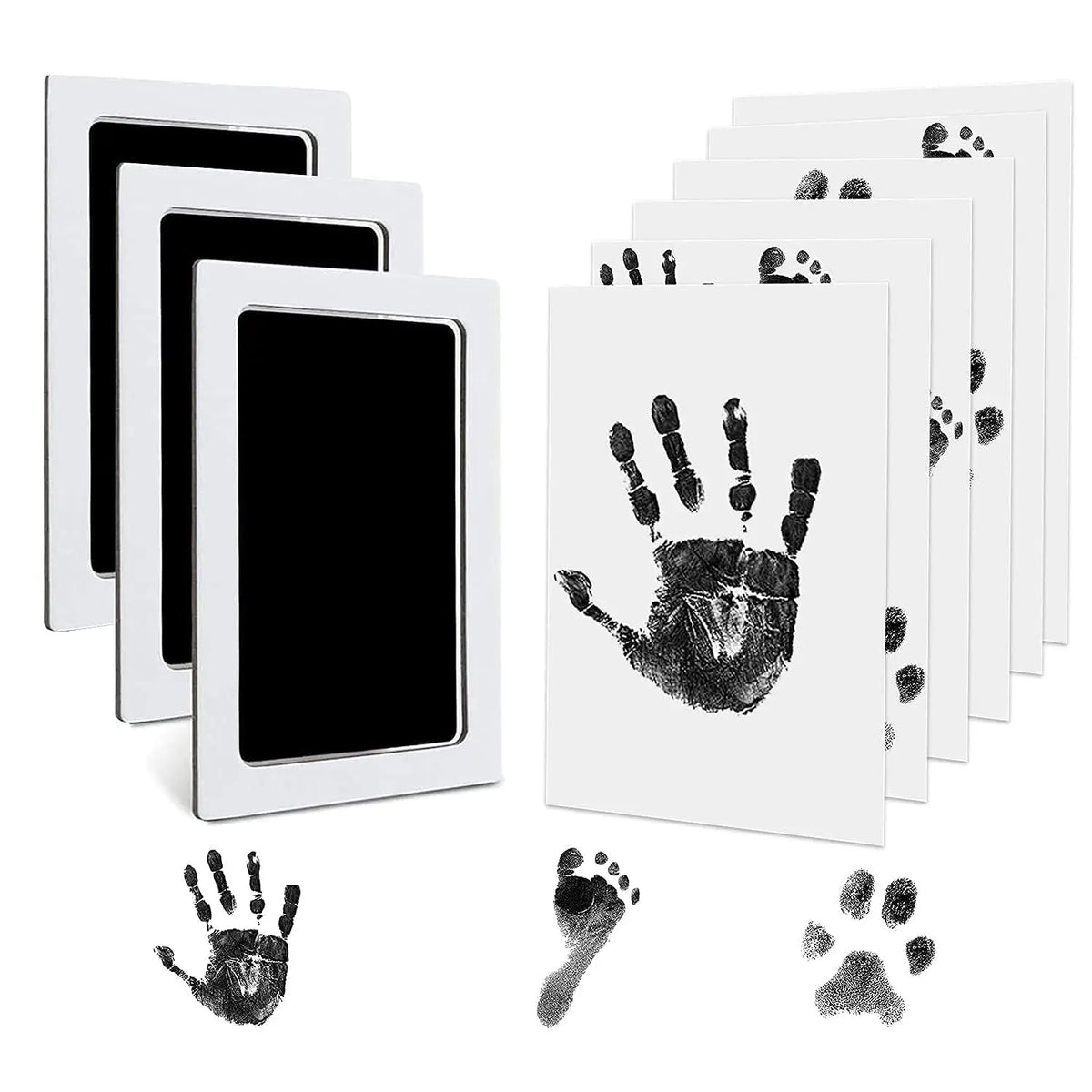 A set of white frames displaying black ink paw prints for dogs and cats.