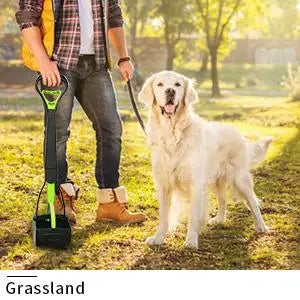 A person is using a foldable pet poop scooper to clean up dog waste on the grass.
