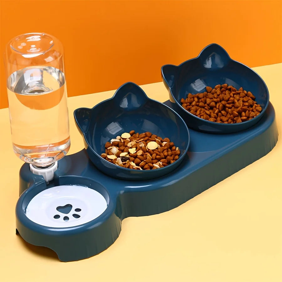 Blames Essschale Set mit Schwerkraft-Wasserverteiler und Trockenfutterschale auf gelbem Untergrund.