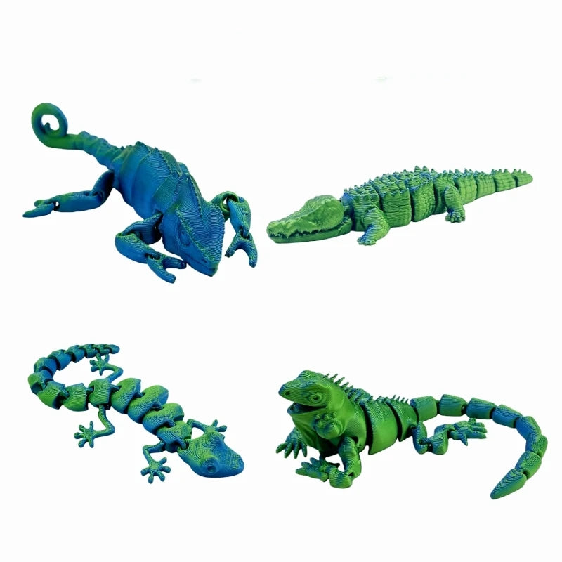 A set of three 3D printed reptile figurines including a lizard, chameleon, gecko, and crocodile.