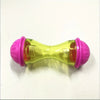 Juguete de pelota de plástico rosa brillante y amarillo para mascotas, con forma de cuenco para alimentar.