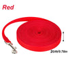 Red nylon dog training leash with solid color long lead rolled up