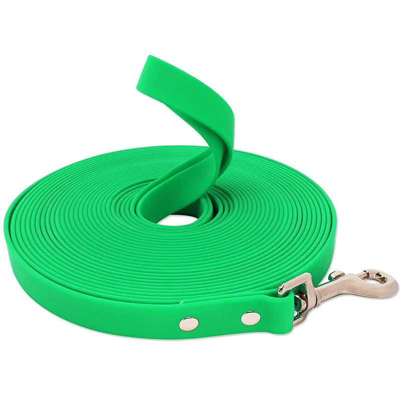 A coil of bright green heavy-duty waterproof dog leash with a buckle attached.