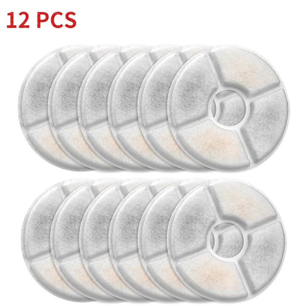 Twelve replacement filters for pet water fountains, stacked in a row.