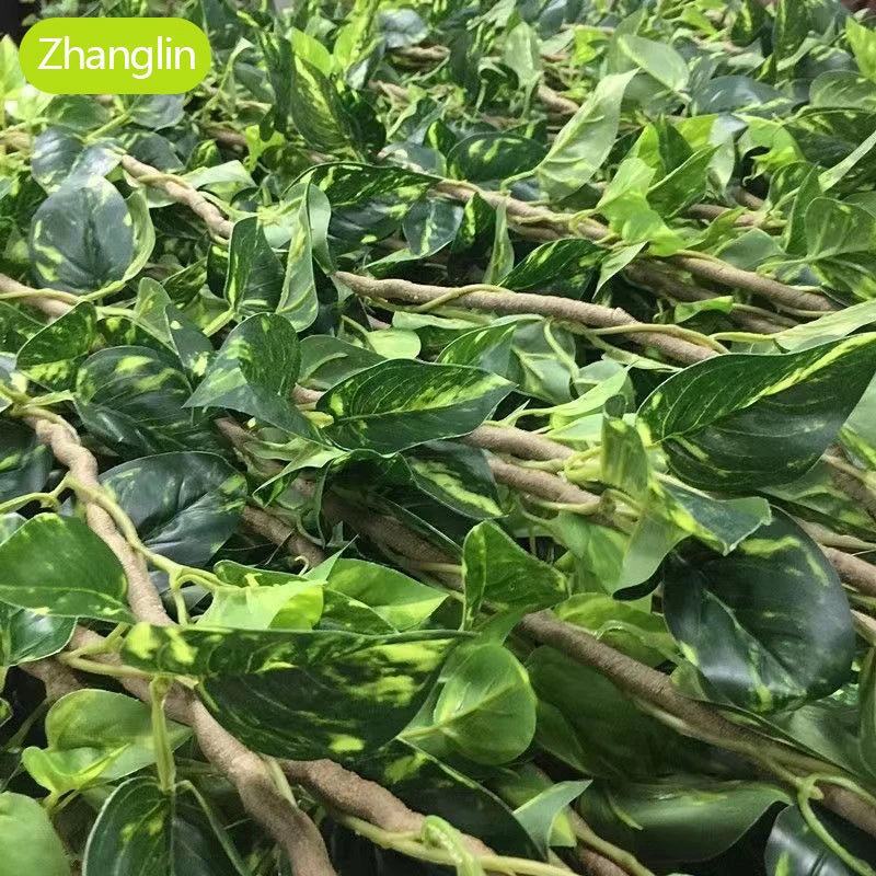 Artificial green vine wall hanging decor featuring lush green leaves with yellow variegation