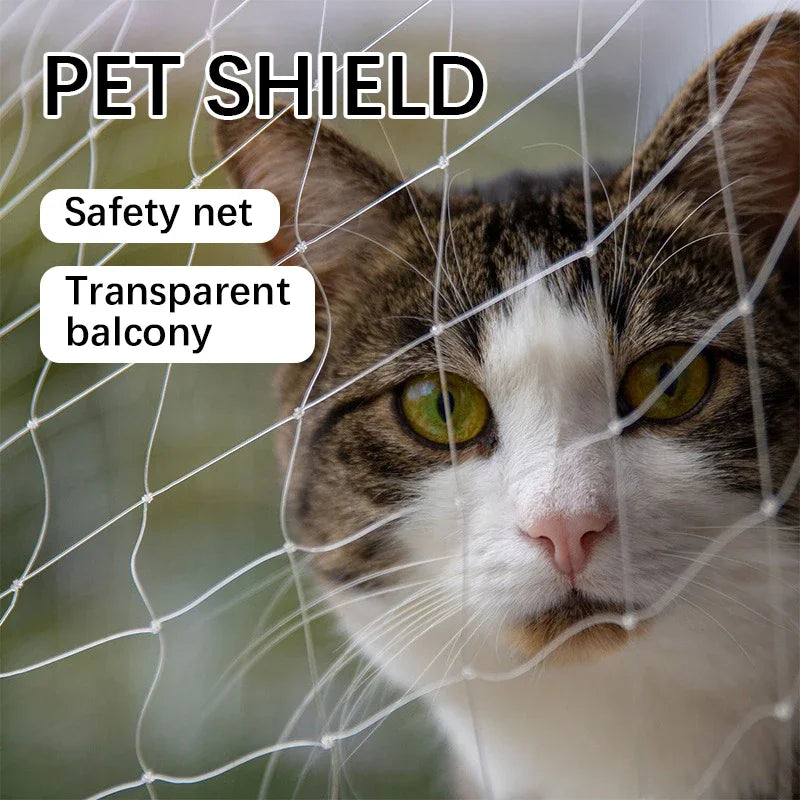 A tabby and white cat looking through a transparent safety net designed for pet shielding on balconies.