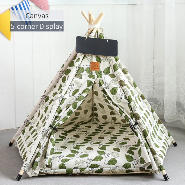 A canvas 5-corner display tent with a cushion and chalkboard inside.