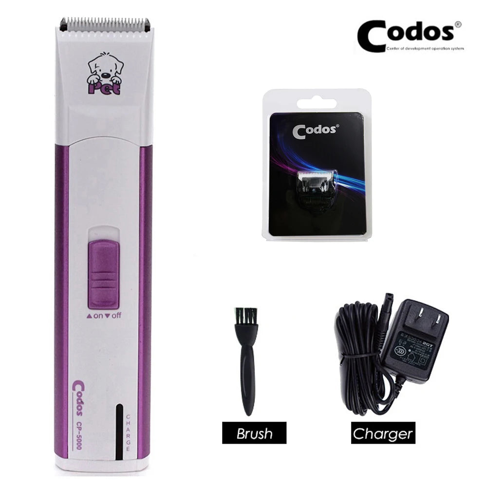 A white and purple electric pet grooming clipper set including the device, brush, and charger.
