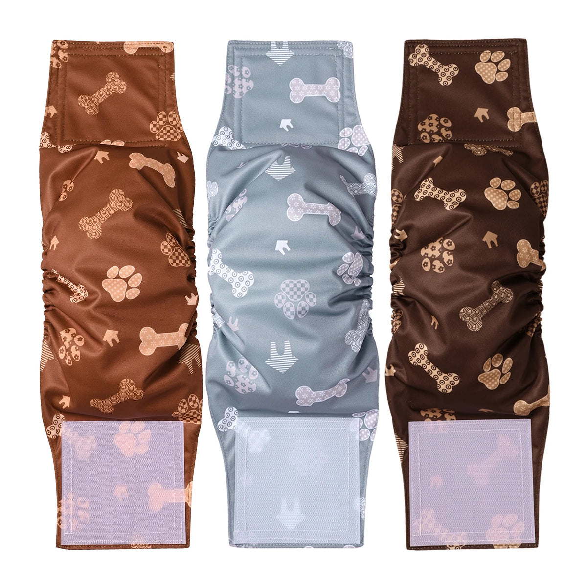 Three reusable adjustable belly bands for male dogs in brown and light blue patterns.