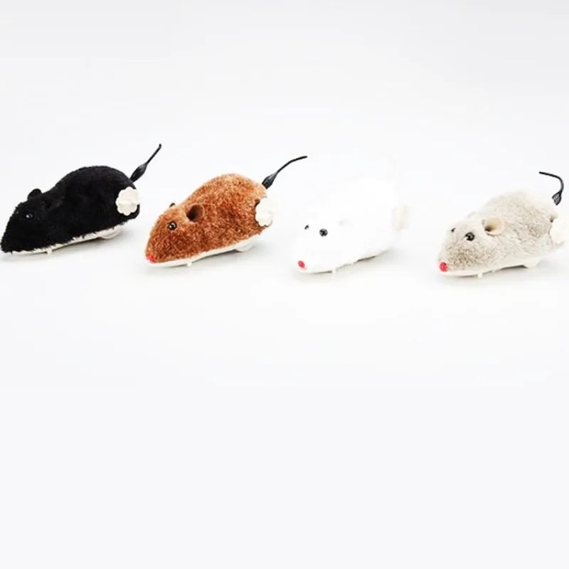 A collection of four clockwork plush mouse cat toys in black, brown, white, and gray.